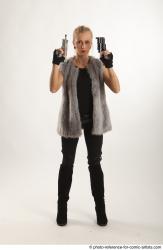 NIKOL STANDING POSE WITH TWO GUNS